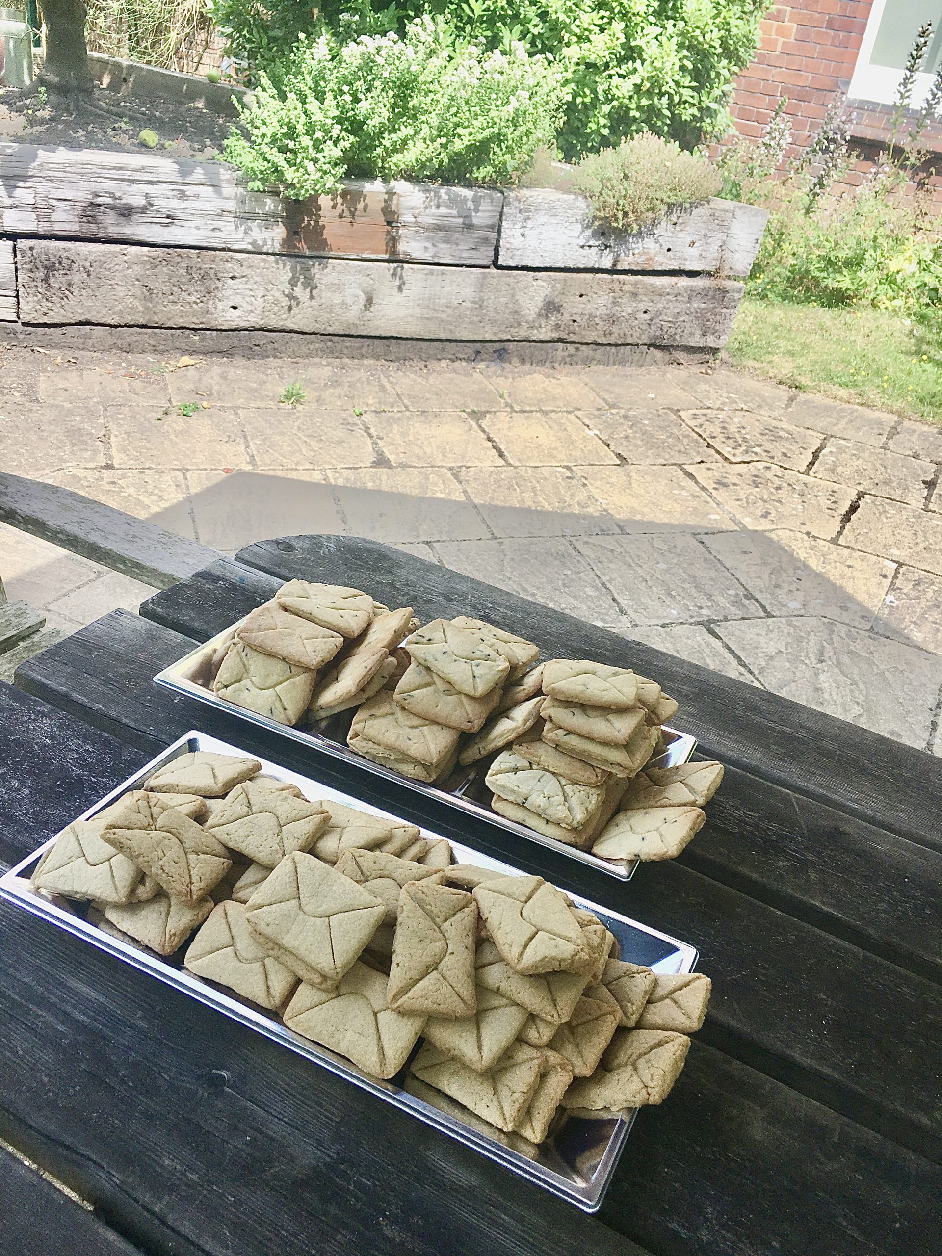 A picture of baked biscuits in the shape of letter biscuits