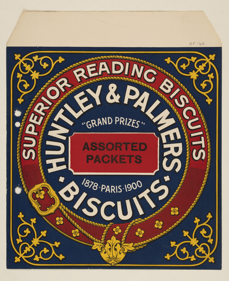 Huntley & Palmers biscuit label showing the company’s red, blue, and gold “garter and buckle” design, reading “Superior Reading Biscuits - Assorted Packets  - Grand Prizes, 1878 Paris 1900.