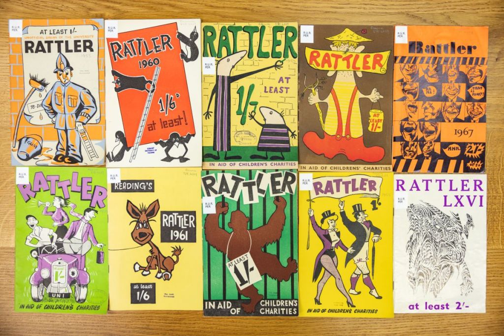 A selection of colourful vintage covers from “Rattler,”the Reading University Students' Union RAG (Raise And Give) magazine, showcasing illustrated designs from the 1950s and 1960s.
